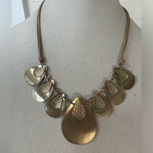 Industrial meets minimalist style drop goldtone dangle necklace